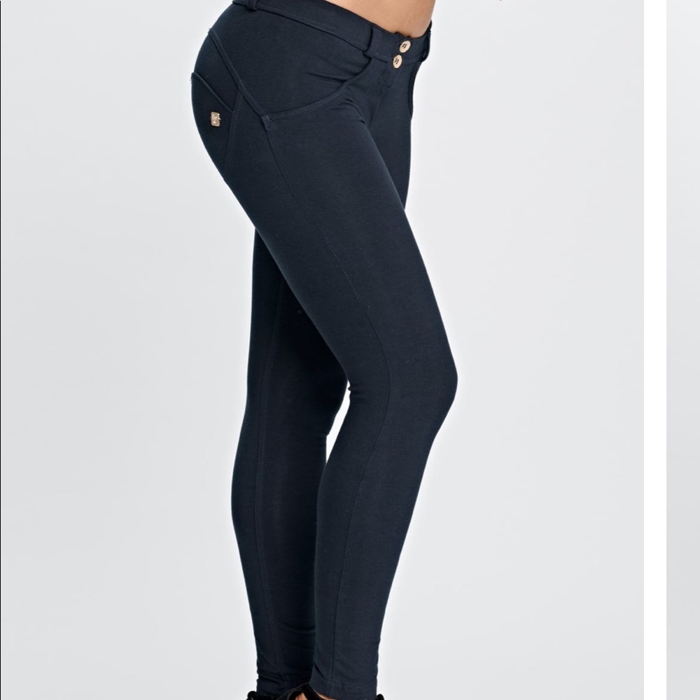 Navy skinny Freddy pant, mid-rise.